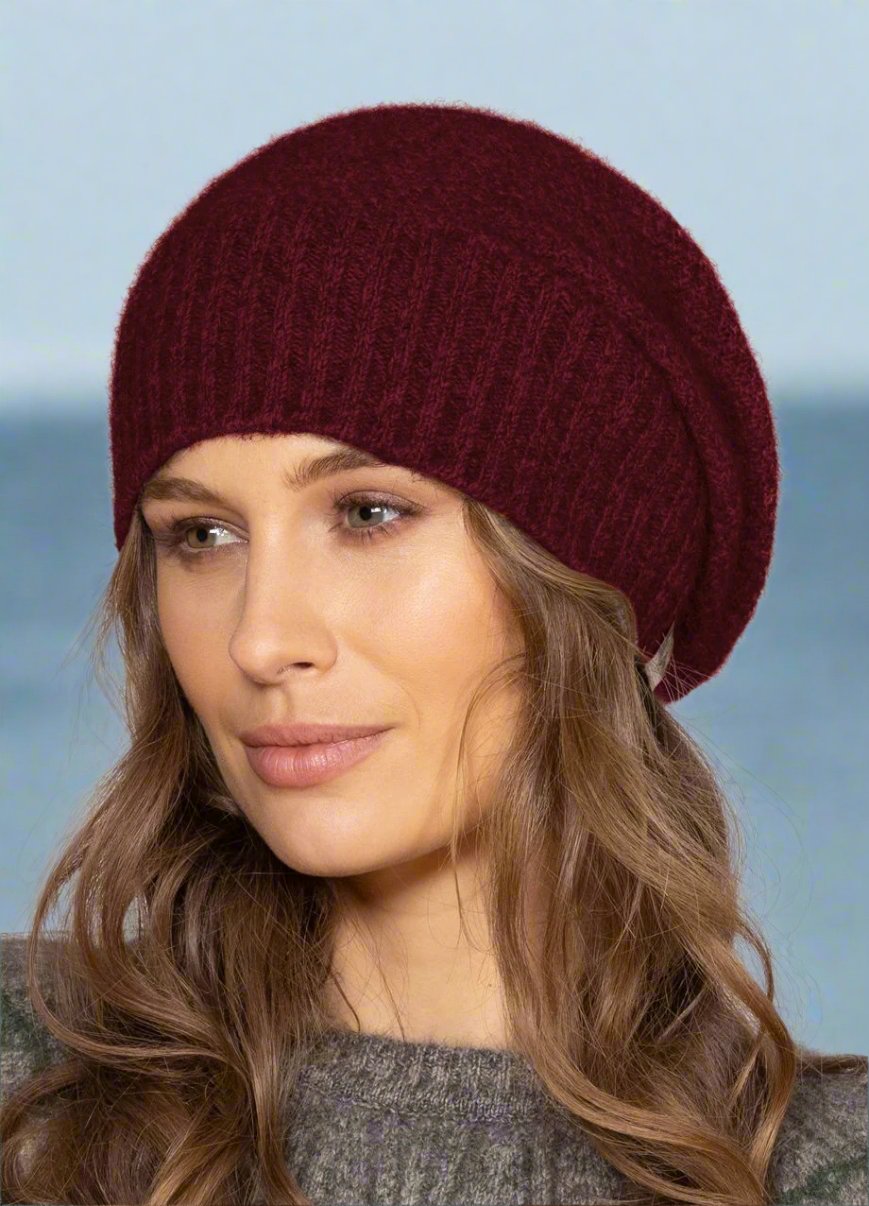 This very cool baggie beanie is knitted in a moss stitch with a rib band that can be worn as is or folded back. Made from a blend of possum merino it will keep you warm as well as looking stylish! Available in one size only. Made in Christchurch, NZ by Noble Wilde.
