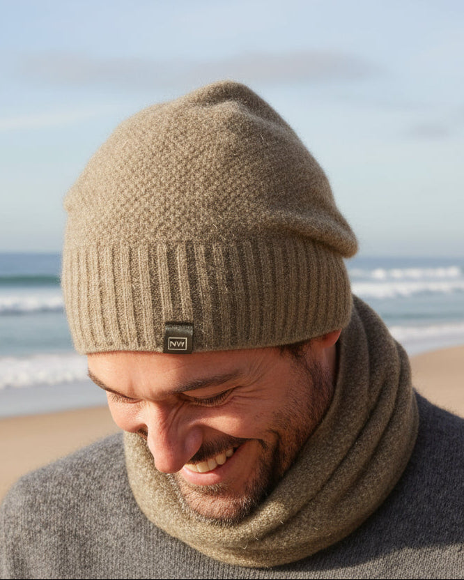 This very cool baggie beanie is knitted in a moss stitch with a rib band that can be worn as is or folded back. Made from a blend of possum merino it will keep you warm as well as looking stylish! Available in one size only. Made in Christchurch, NZ by Noble Wilde.