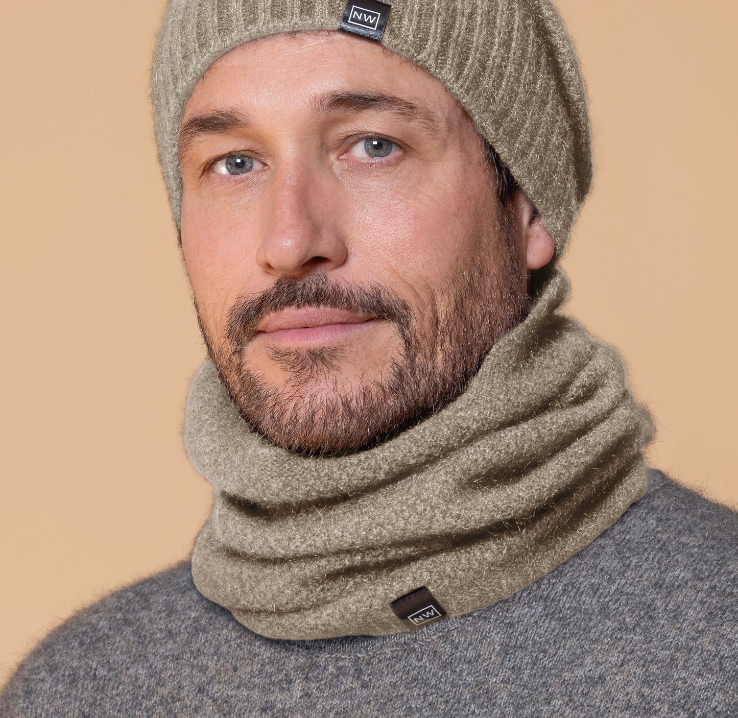 This fashion one piece neck warmer is knitted in a moss stitch. It can be worn scrunched down or folded down. Made from a blend of possum merino and available in one size only. Made in Christchurch, NZ by Noble Wilde.