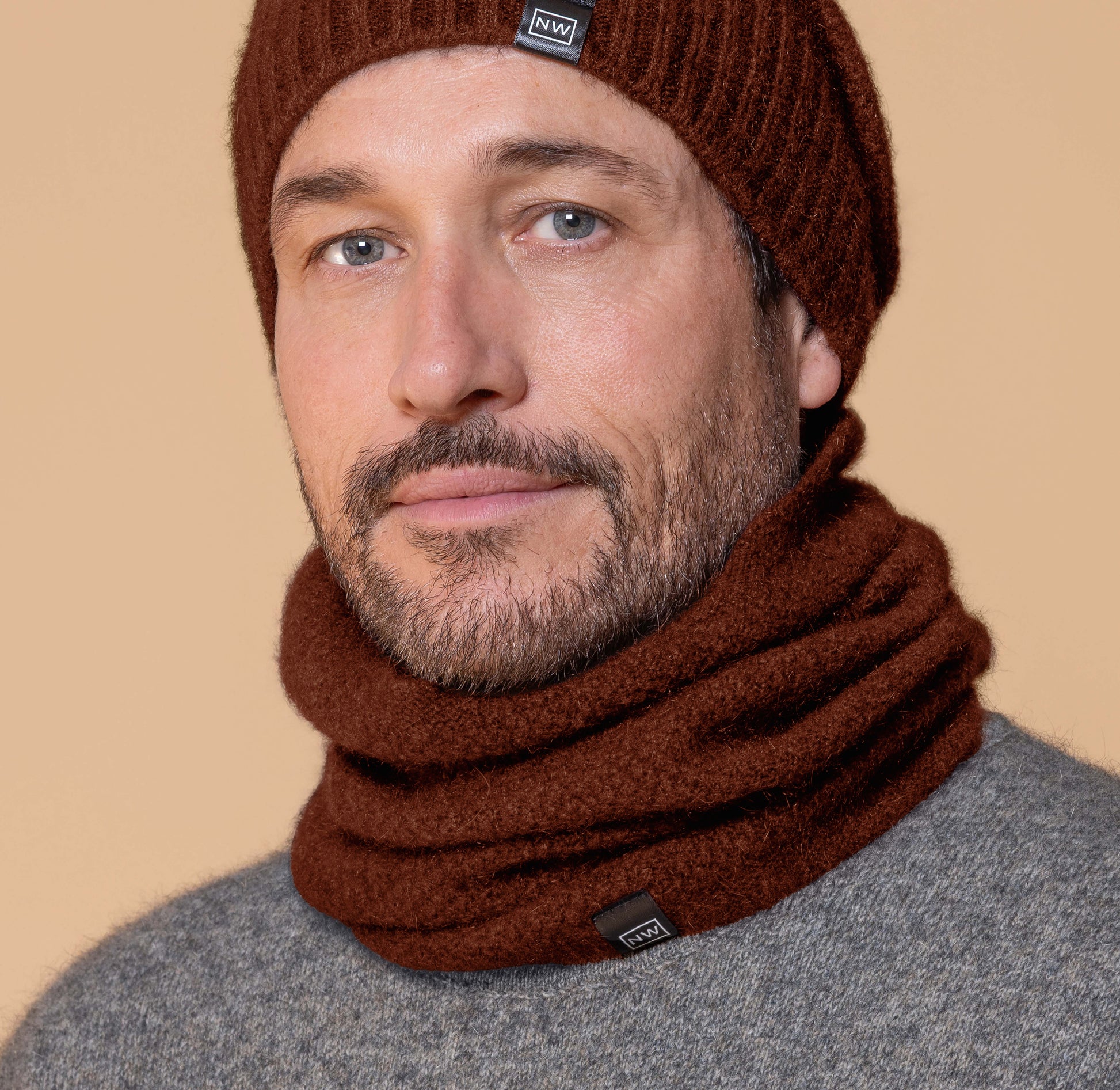 This fashion one piece neck warmer is knitted in a moss stitch. It can be worn scrunched down or folded down. Made from a blend of possum merino and available in one size only. Made in Christchurch, NZ by Noble Wilde.&nbsp;