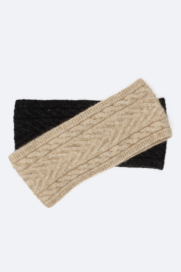 A stylish cable knit headband. Light, warm and so soft to wear. Made from a luxury blend of 20% soft possum fur, 70% fine merino wool & 10% silk. One size fits most. Made in NZ by Manawatu Knitting Mills.