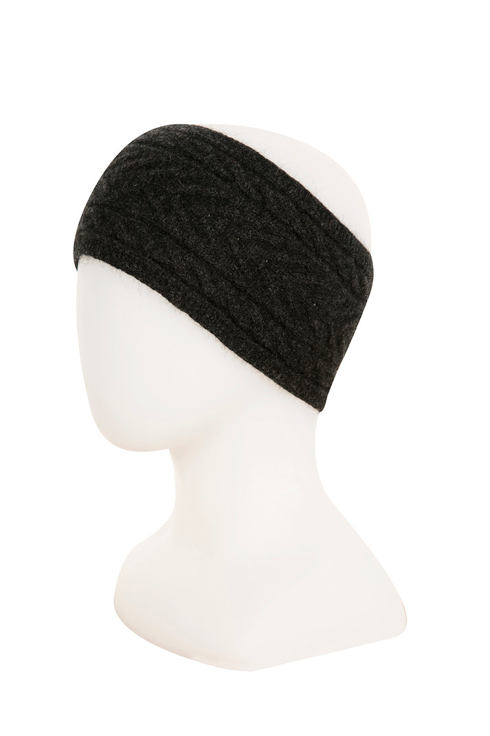 A stylish cable knit headband. Light, warm and so soft to wear. Made from a luxury blend of 20% soft possum fur, 70% fine merino wool & 10% silk. One size fits most. Made in NZ by Manawatu Knitting Mills. Charcoal.