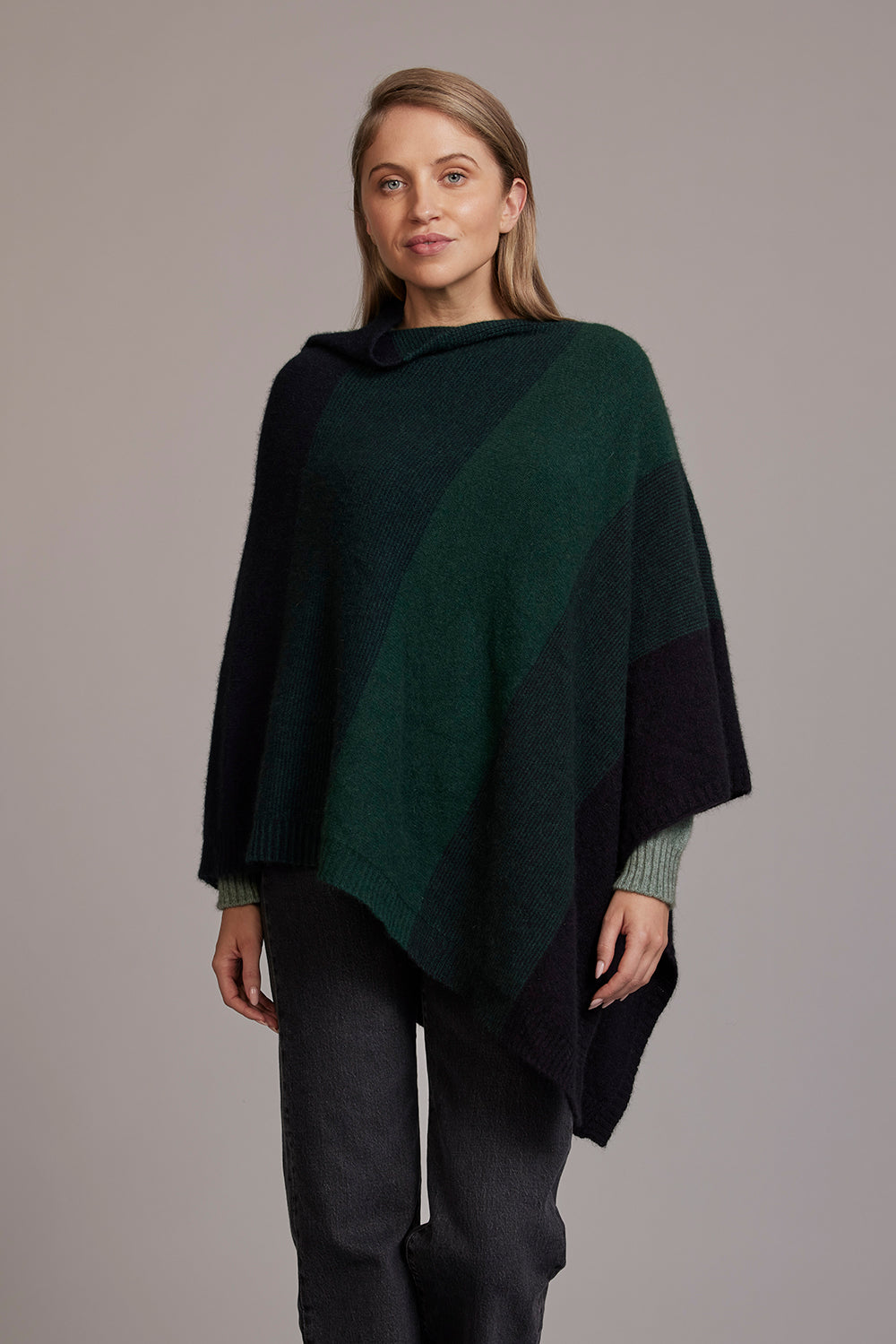 McDonald Ombre Poncho is their signature piece available in eight beautiful colour combinations. The incredible drape and classic style of this poncho will make it your go-to piece whenever there is a chill in the air.