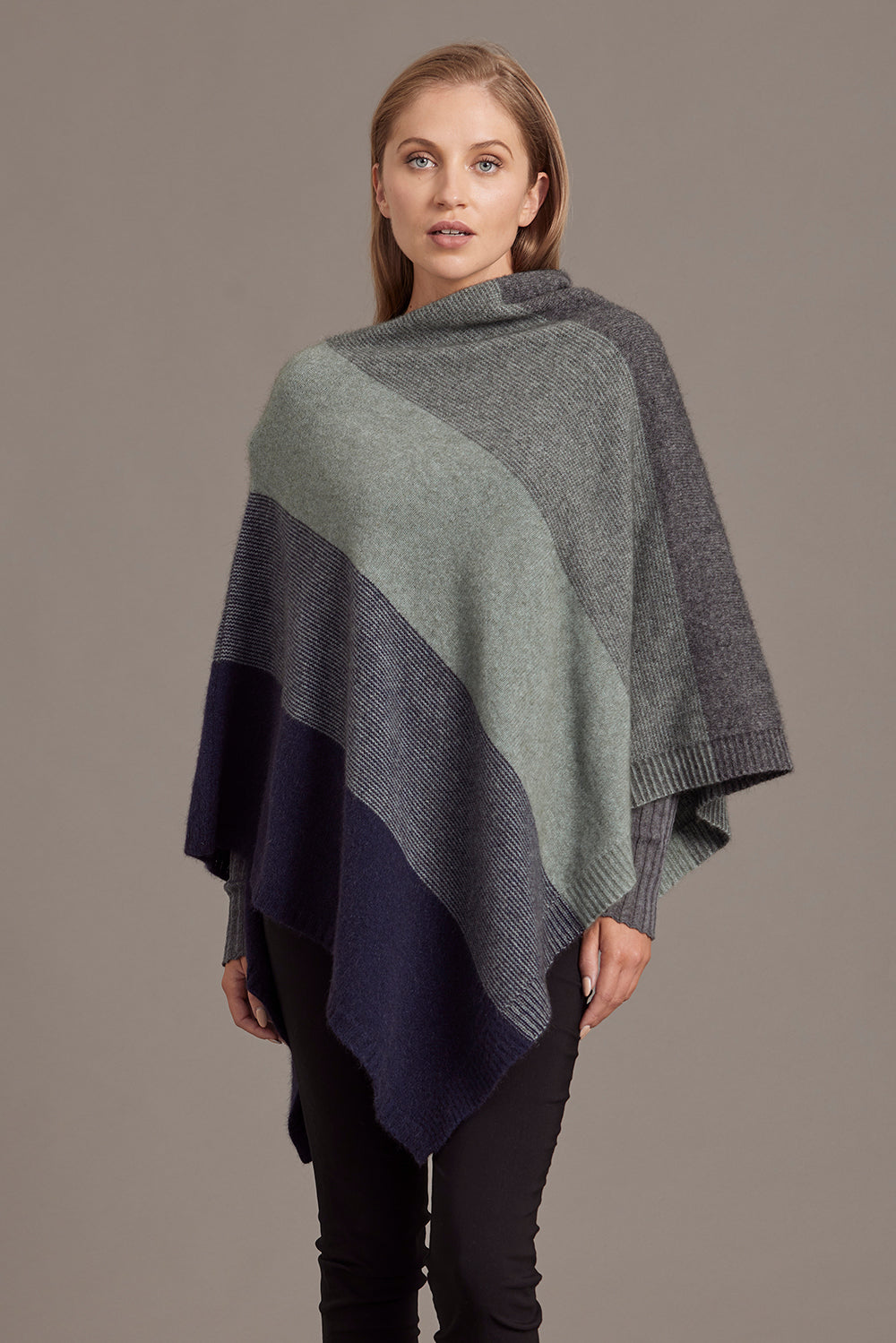 McDonald Ombre Poncho is their signature piece available in eight beautiful colour combinations. The incredible drape and classic style of this poncho will make it your go-to piece whenever there is a chill in the air.