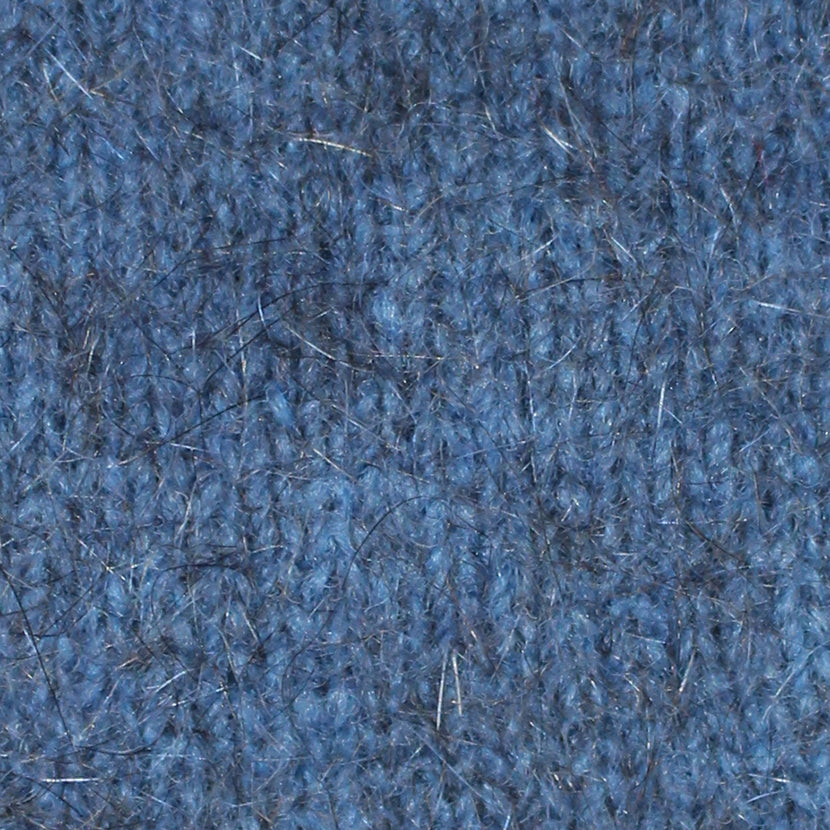 A double thickness beanie with rib (no turnback) sits close to the skull. Made from a possum merino blend by Lothlorian, NZ. Light Blue.
