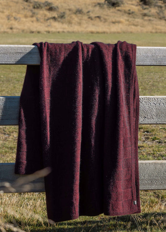 The ultimate in luxury is the stunning Queen Size Throw. Knitted in a basketweave stitch the texture of this pattern plays with the light and shows off the beautiful colours of the yarn. A fabulous edition to any living room or bedroom. Proudly made by Noble Wilde of NZ.
