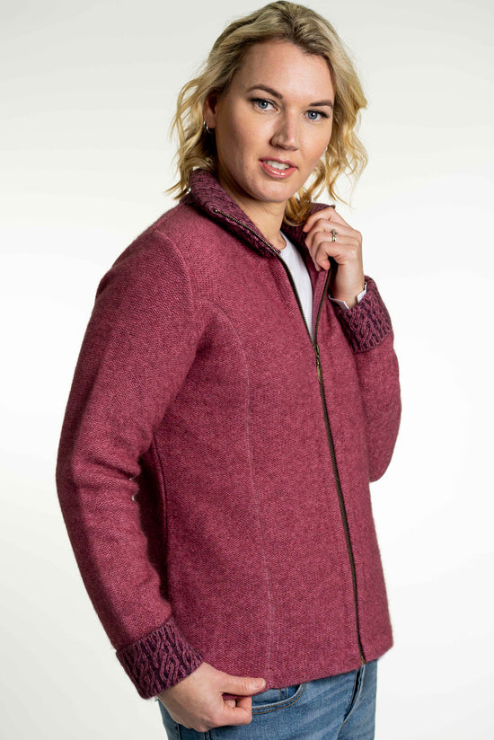 Koru's zip through jacket is stylish yet versatile. Featuring a two tone trim on the collar & cuff it is beautifully designed with side seam shaping and coverseam detailing creating a lovely, streamlined look. Available in sizes XS - 2XL. Proudly made in Warkworth, NZ. Rose/Grape