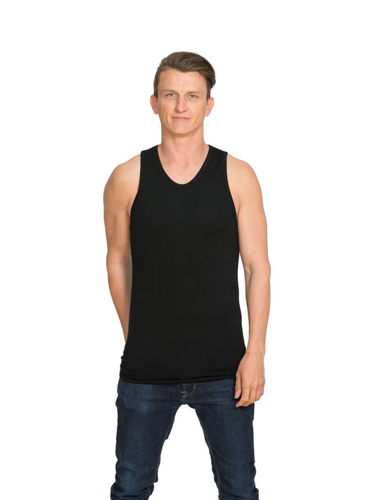 Designed with a lower round neck this merino singlet is discreet under any top in black or ivory white. Tuck in the shaped tail at the back for extra warmth. This is a slim fit base layer. Sizes S - 3XL. Proudly made in NZ. Black.