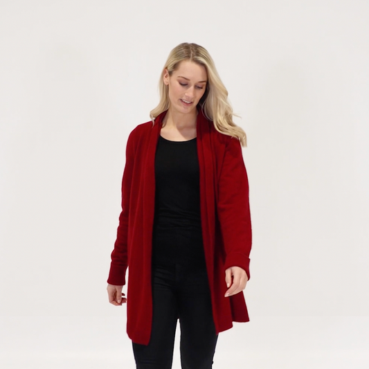 Knitted in a luxury blend of possum and merino, this open front relaxed style jacket is a fashion essential in any wardrobe. So versatile you can dress it up or down. Soft, warm and light, perfect for travel too! Made in NZ by Manawatu Knitting Mills. Sizes S - 2XL. Berry.