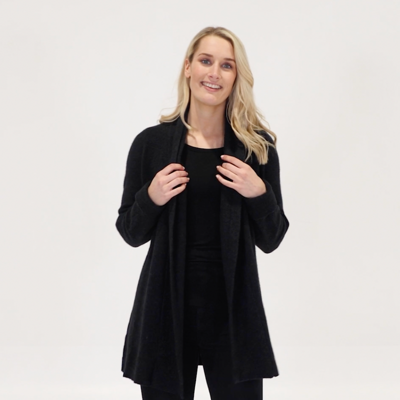 Knitted in a luxury blend of possum and merino, this open front relaxed style jacket is a fashion essential in any wardrobe. So versatile you can dress it up or down. Soft, warm and light, perfect for travel too! Made in NZ by Manawatu Knitting Mills. Sizes S - 2XL. Black.