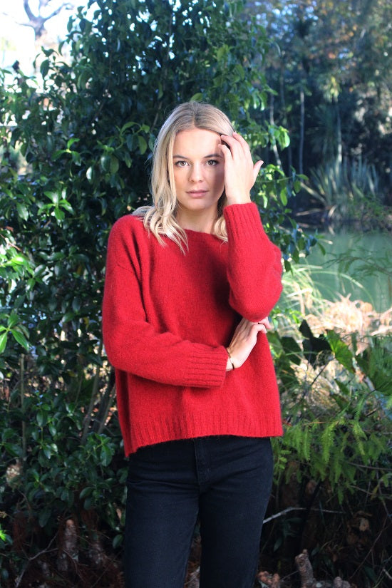 Knitted on a larger needle, this is a looser knit which is light as a feather. A crew neck, gently curving ribbed hem and looser cuffs makes the vapour jumper a must have, Great for any season. Sizes S, M, & L. Made in NZ by Lothlorian for their Zinity Collection. NOTE: * denotes a custom colour knitted for our store & not always readily available. Red.