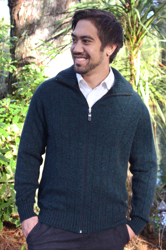 A men's possum merino ribbed full zip jacket with collar. It can be worn open or zipped up for extra warmth. Great with jeans or dress pants. Made in NZ by Lothlorian for their Zinity Collection. Available in sizes S, M, L, XL, XXL.  Tasman Marl.