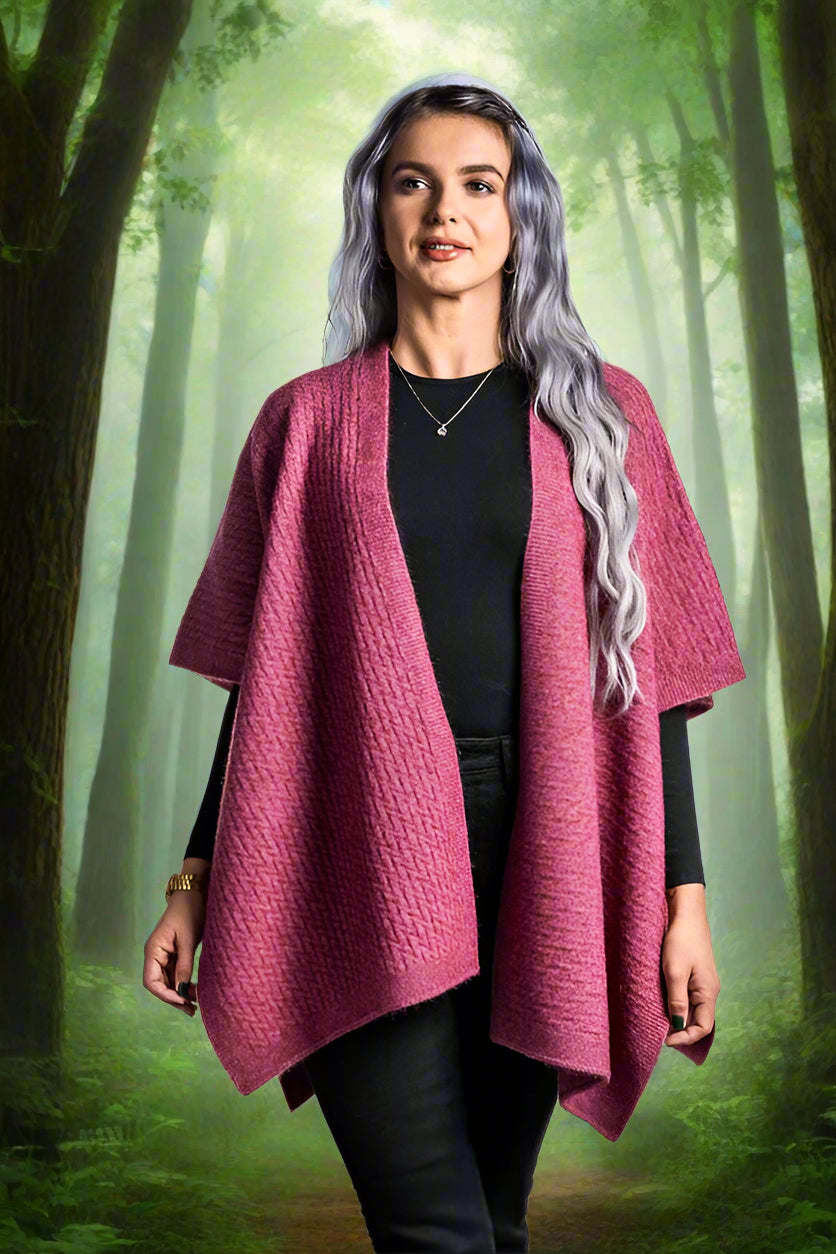 A great "throw on and go" piece to add to your collection. This fabulous cape has a small seam to form a loose and practical arm hole. In a detailed zig zag pattern, you can dress this cape up or down to suit any occasion. Made in Warkworth, NZ by Koru Knitwear. Rose
