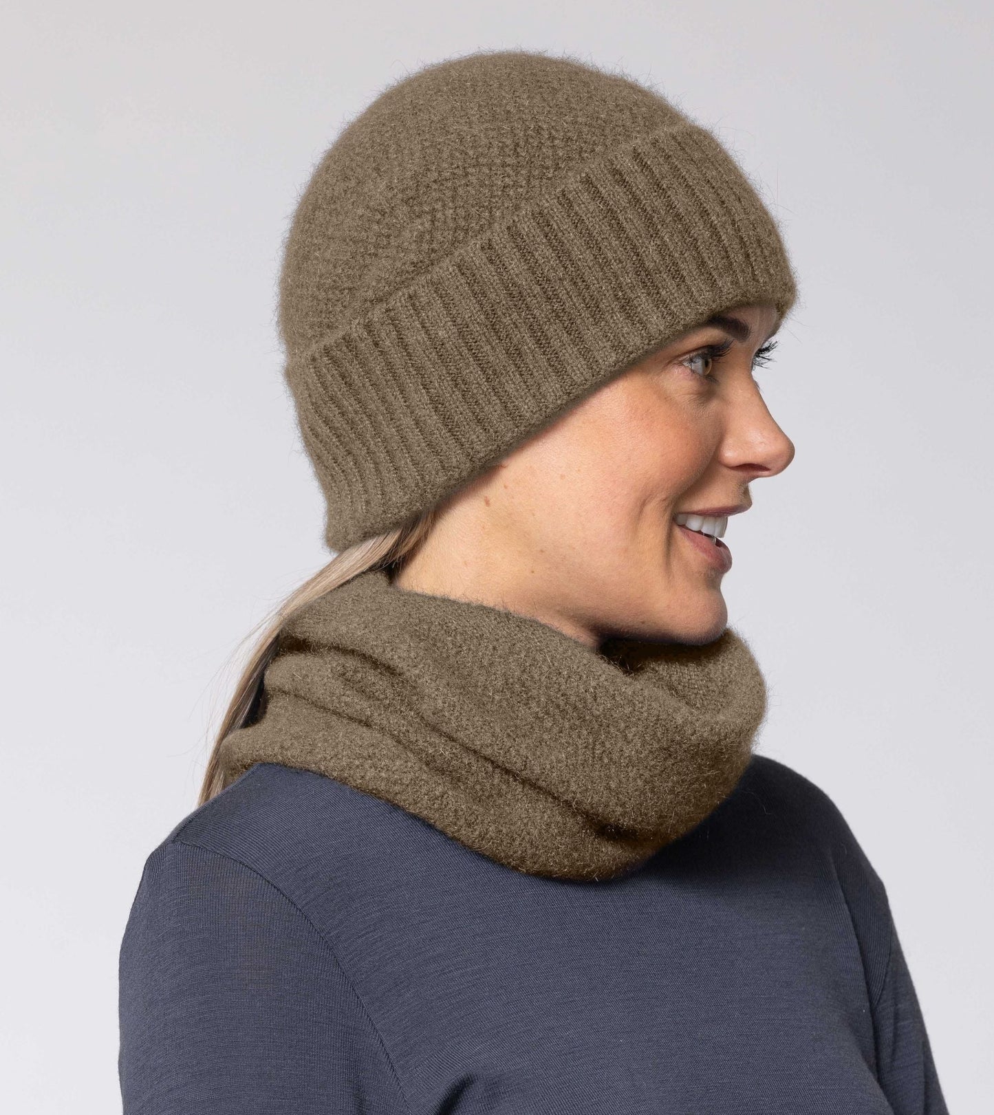 This fashion one piece neck warmer is knitted in a moss stitch. It can be worn scrunched down or folded down. Made from a blend of possum merino and available in one size only. Made in Christchurch, NZ by Noble Wilde.