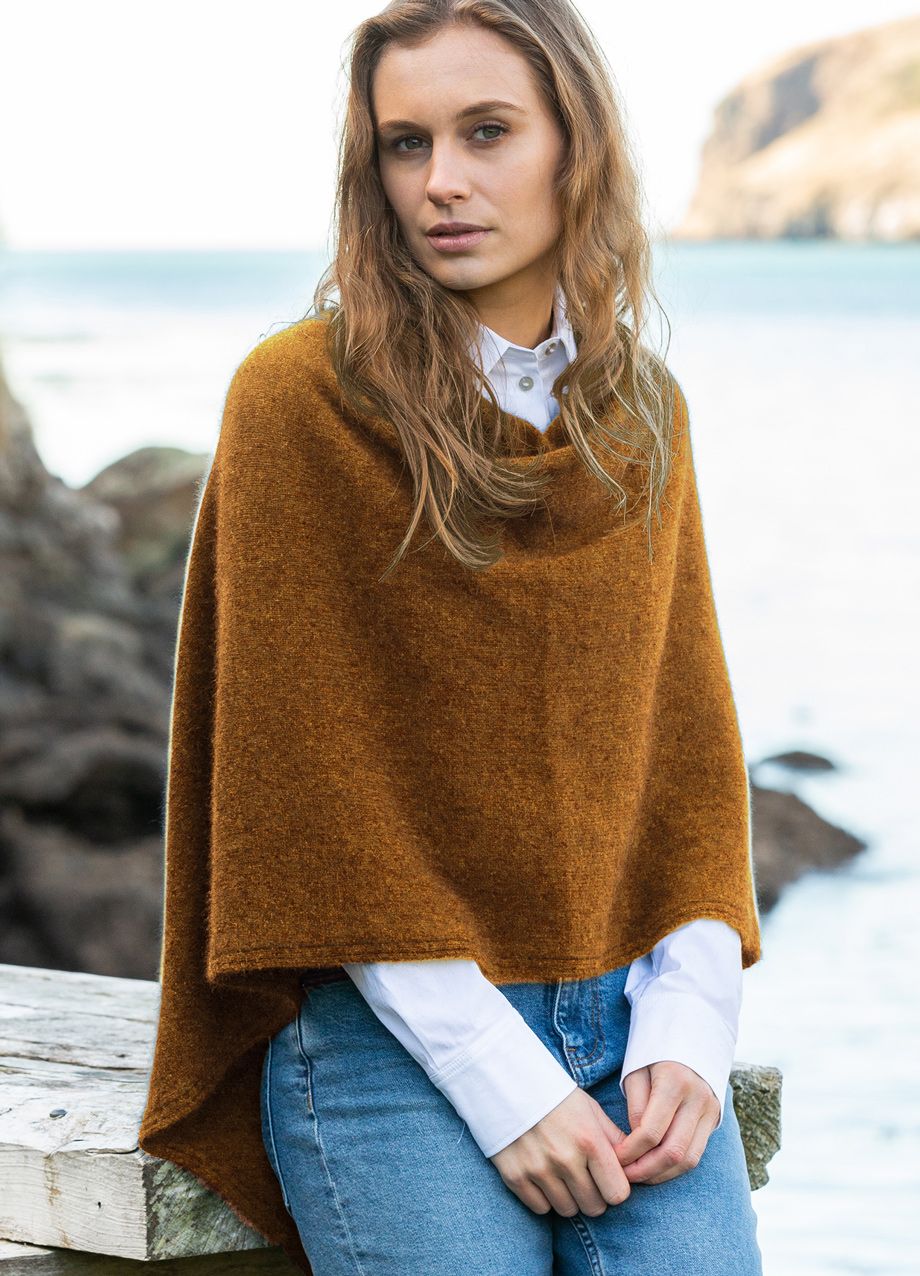 Designed for comfort, freedom and style this single jersey construction poncho can be worn numerous ways from a cape to knee rug and even a scarf. Made from a beautiful blend of possum merino the North Cape is light, warm and so versatile. In many gorgeous colourways and one size only. Made in Christchurch, NZ by Noble Wilde.