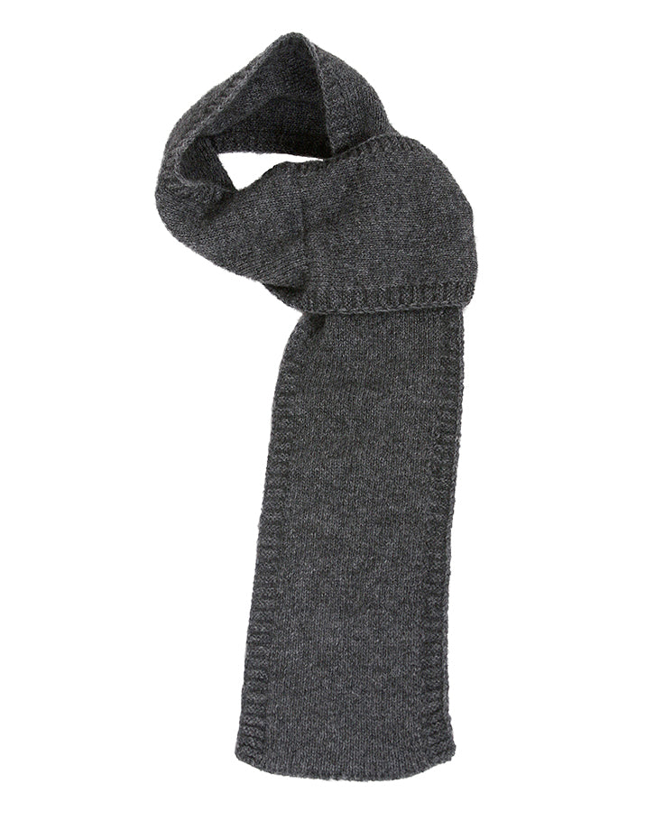 A cute little double thickness scarf using whole garment technology to create an integrated loop. Approx 14cm wide x 94cm long. Made in NZ by Lothlorian. Charcoal.